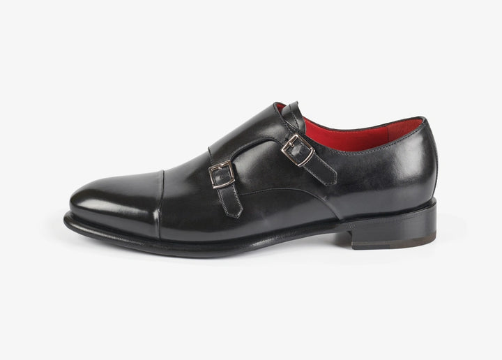 Double-buckle shoe with folded toe cap