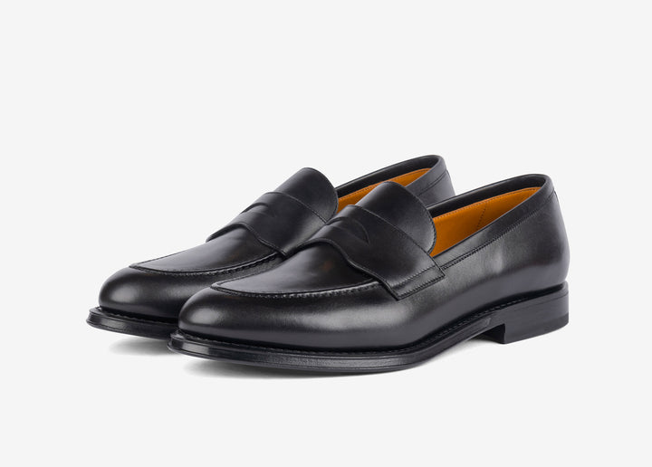 Black penny loafer in hand-aged leather
