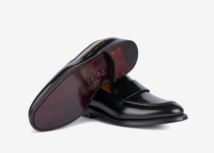 Black loafer with band in calfskin