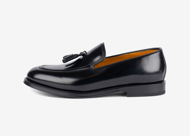 Brushed leather loafer with tassels