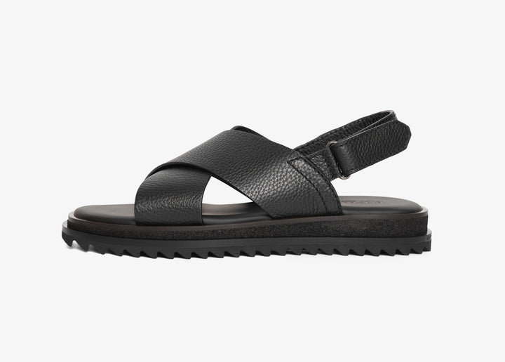 Black sandal with woven straps
