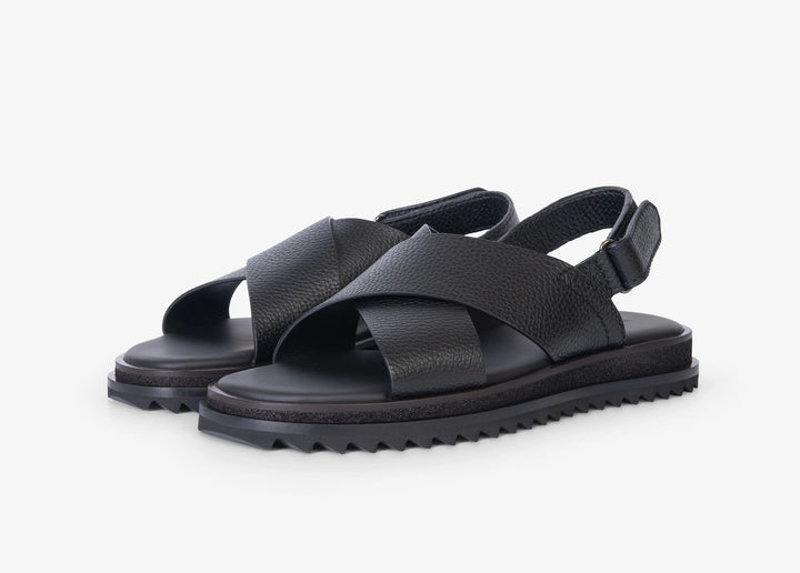 Black sandal with woven straps